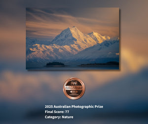 Mountain landscape with a 2025 Australian Photographic Prize badge and score on a blurred background